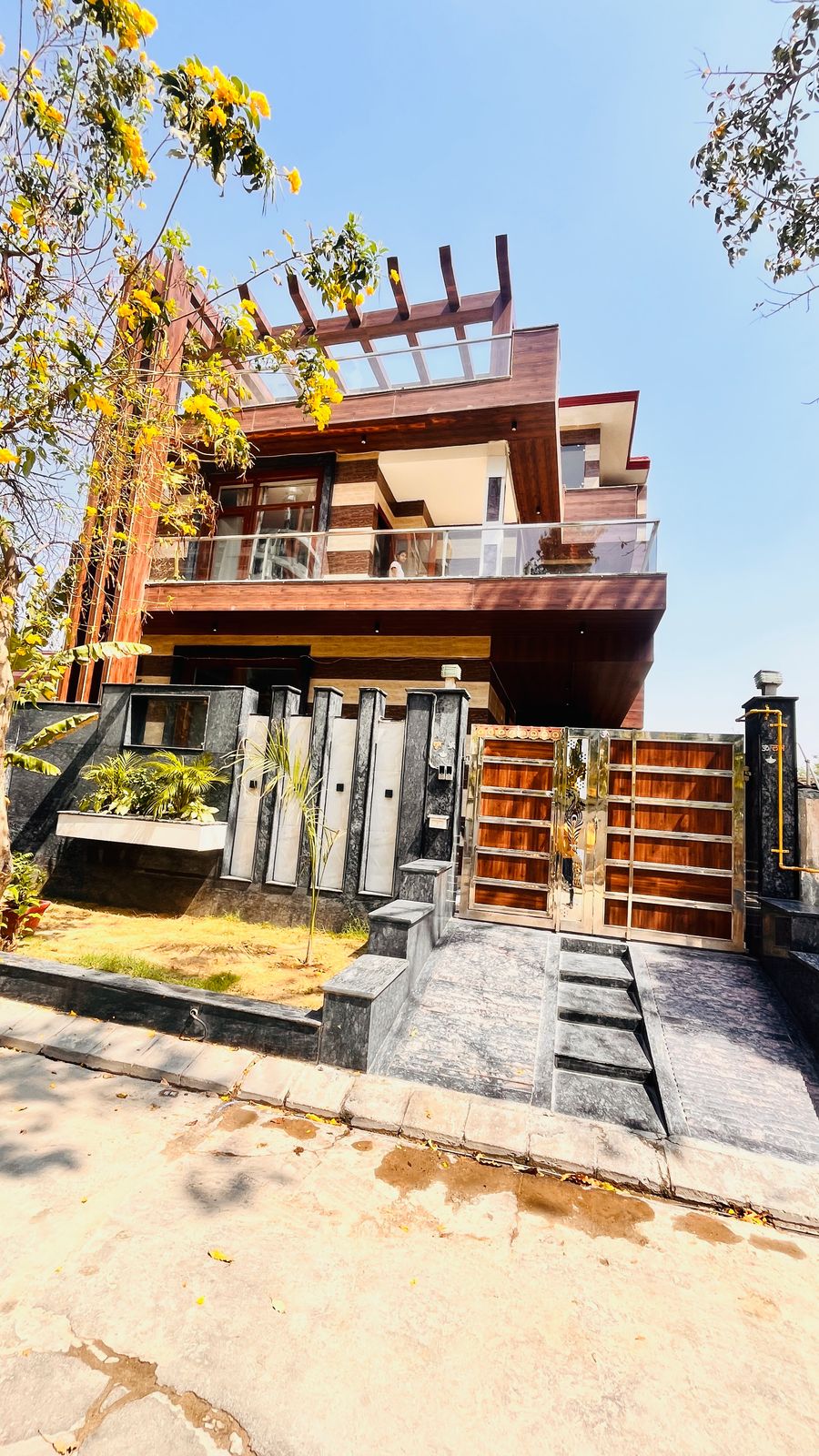 3-storey villa in OMAXE NRI City, Pari Chowk – 250 sqm property with 3BHK units on each floor and basement parking